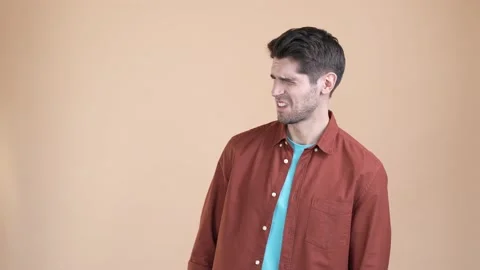 Guy look empty space no like stinky odor isolated pastel color background Stock Footage 169938245