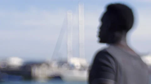 Guy looking around at the harbor 02 Видео 67522041