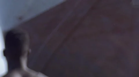 Guy looking around at the harbor 02 Stock Footage 67522113