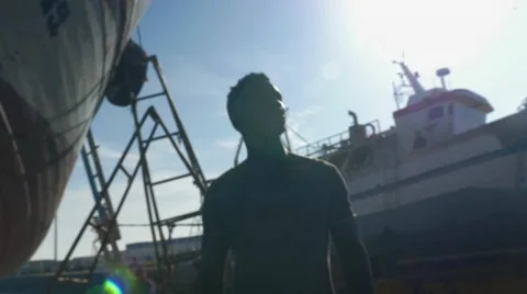 Guy looking around at the harbor 06 Видео 67532360