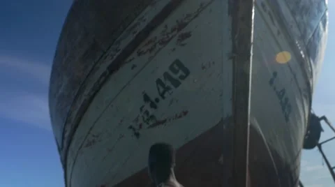 Guy looking around at the harbor 07 Video stock 67532357