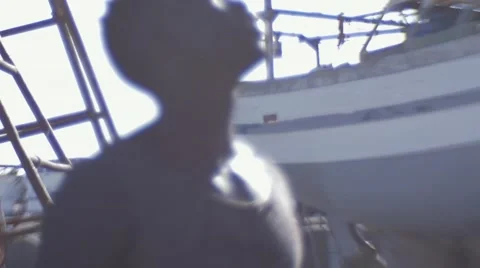 Guy looking around at the harbor 08 Video stock 67522043