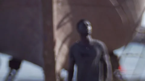 Guy looking around at the harbor 10 Stock Footage 67522107