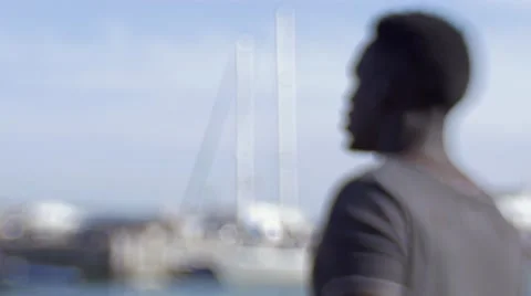 Guy looking around at the harbor 12 Stock Footage 67522090