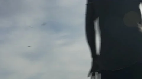Guy looking at the birds in the sky 11 Video stock 67556113