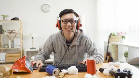Guy looking at camera as computer screen Stock Photos