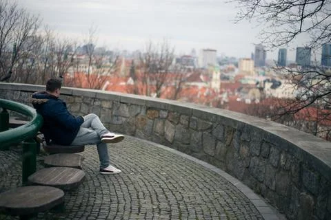 Guy looking at the center of the old town of Bratislava Stock Photos