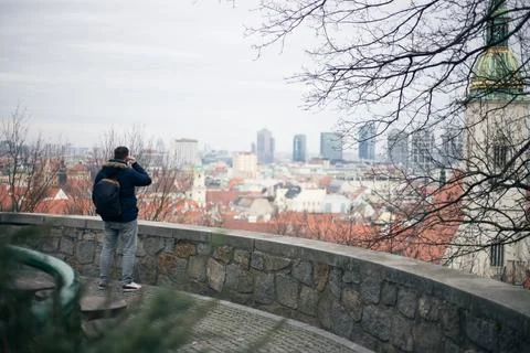 Guy looking at the center of the old town of Bratislava Stock Photos
