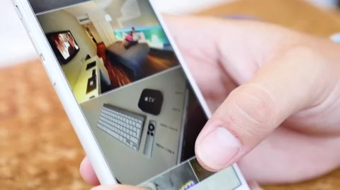 A guy is looking at the screen of his smartphone Stock Footage 58606626