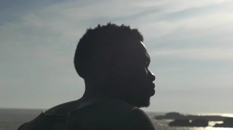 Guy looking at the seashore 04 Video stock 67556380