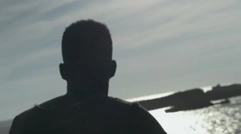 Guy looking at the seashore 05 Видео 67556384