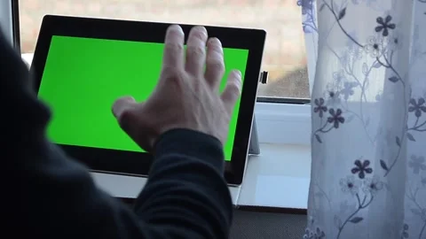 The guy is looking at the tablet Stock Footage 263803142