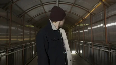 Guy looks back and says something Stock Footage 80479449