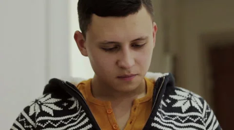 The guy looks at the book Stock Footage 56433047