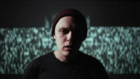 Guy looks at the camera and move his head Stock Footage 80516417