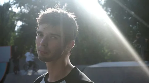 Guy looks into the camera and turns away 스톡 동영상 103649992