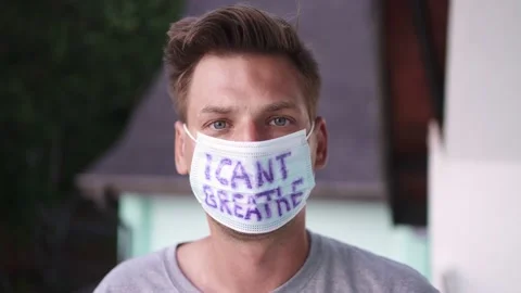 A guy looks into the camera in a close-up Stock Footage 154807114