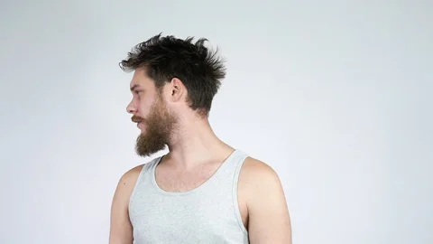 The guy looks at his bald head in the mirror and crying.before and after. Stock Footage 122292759