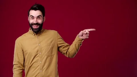 The guy looks to the side and points his finger there, and the other like Stock Footage 165620915