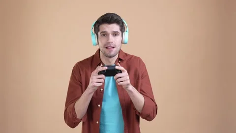 Guy lose joy stick speed race annoyed isolated pastel color background Video stock 169938321