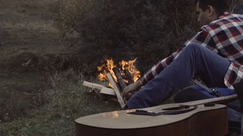 The guy made a fire outdoors Stock Footage 97278008