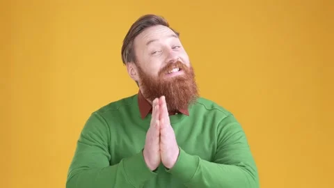 Guy make hands pray sign ask for surprise isolated shine color background Stock Footage 170641588