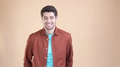 Guy make plead hand gesture ask surprise isolated pastel color background Stock Footage 169937670