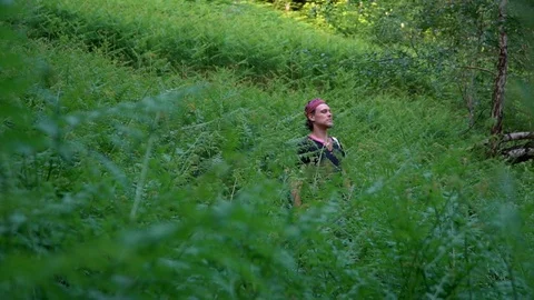 The guy makes his way through the fern Video stock 91184772