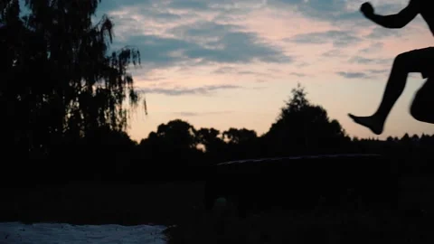 The guy makes a run-up and jumps up with a flip over himself Stock Footage 209247157