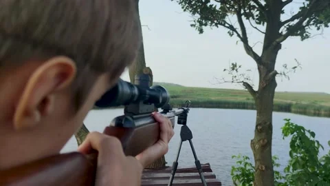 The Guy Makes a Shot with an Air Rifle.  Stock Footage 204966890