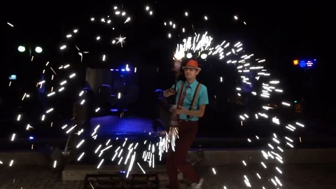 Guy makes sparks, dance Stock Footage 95999907