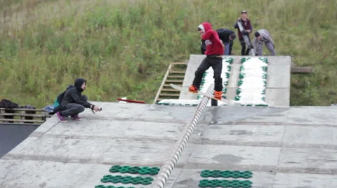 The guy makes a trick on a snowboard lipslayd Stock Footage 59692185