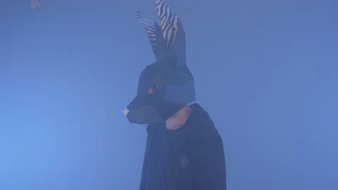 The guy in the mask of a hare. the guy in the haze. Music clip Stock Footage 166399260