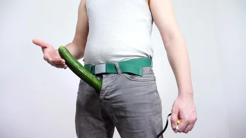Guy measures line of your cucumber. Big size men's happiness. Stock Footage 129402549