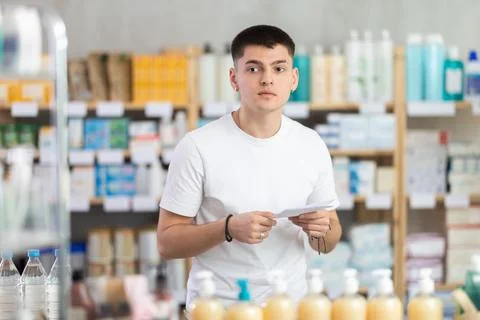 Guy with a medical defect in a pharmacy Stock Photos