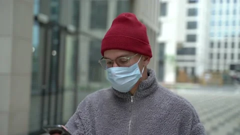 The guy in the medical mask Stock Footage 130877832