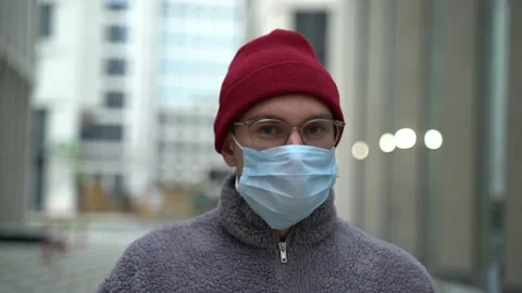 The guy in the medical mask Stock Footage 130877897