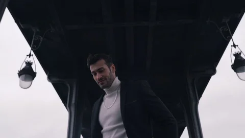 Guy model walks in city and posing Stock Footage 128523131
