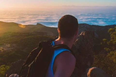 Guy On Mountain Top, Above the Clouds Stock Photos