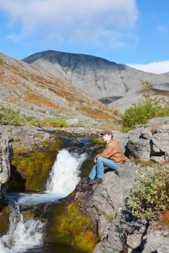Guy in the mountains Stock Photos