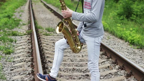 The Guy On The Nature Plays Saxophone Video stock 91867671