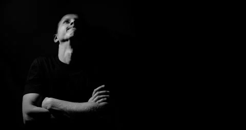 Guy is nervous and rubs his neck. He leaned against the wall Video stock 131720007