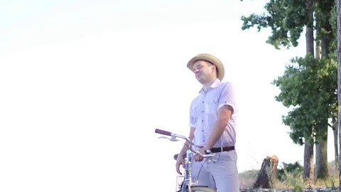 A Guy in a Nice Shirt and Hat Stock Footage 70814317