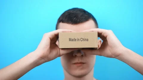 The guy is not happy with the package from China and shows Stockbeeldmateriaal 150332019