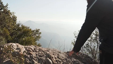 The guy on the observation deck looks at a beautiful view of the mountains Stock Footage 101269956