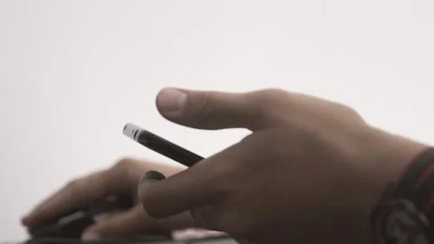 The guy in the office. The guy is working. The guy behind the phone and laptop Stock Footage 130730104