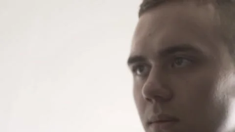 The guy in the office. The guy is working. The guy behind the phone and laptop Stock Footage 130730504