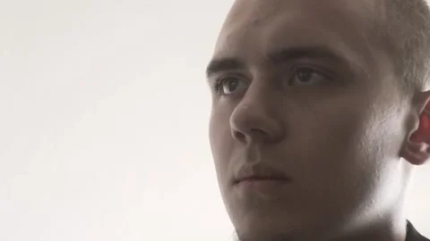 The guy in the office. The guy is working. The guy behind the phone and laptop Stock Footage 130730536