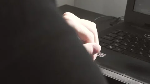 The guy in the office. The guy is working. The guy behind the phone and laptop Stock Footage 130731012