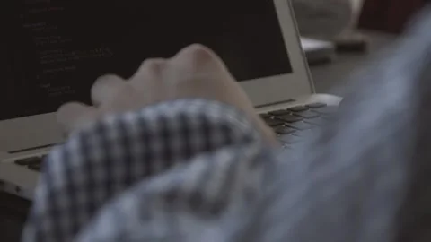 The guy in the office. The guy is working. The guy behind the phone and laptop Stock Footage 130731052